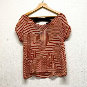 Geometric pattern blouse.